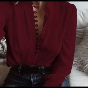 Red blouse with button detail